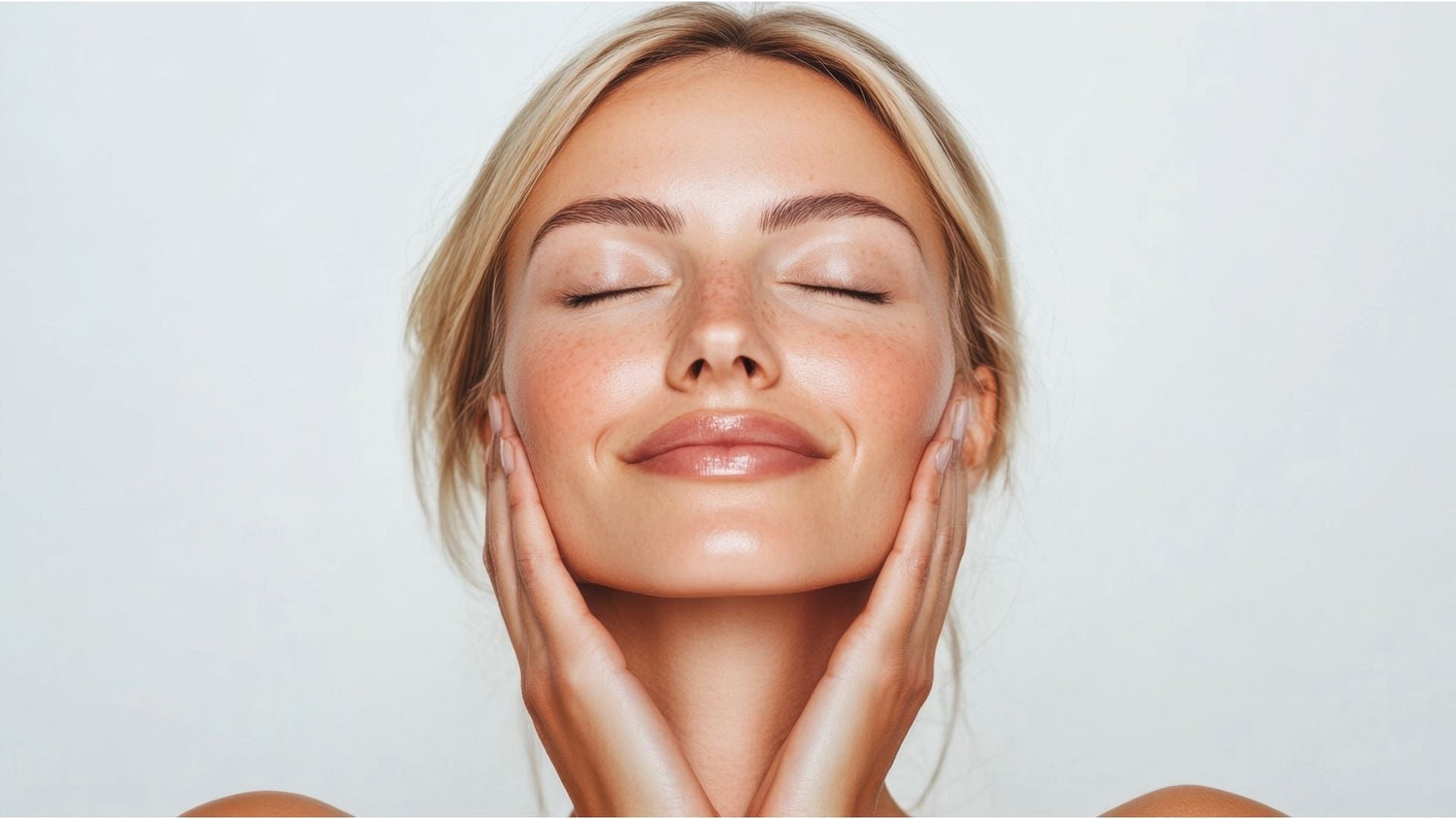 Woman applying skincare